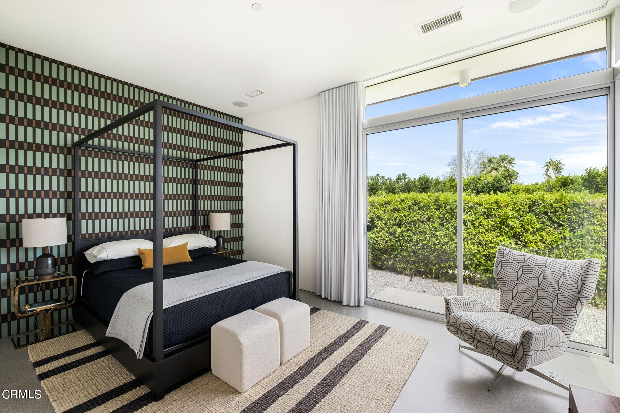 71466 San Gorgonio Road Rancho Mirage, CA 92270 - Photo 21 of 31 a bedroom with furniture and a large window
