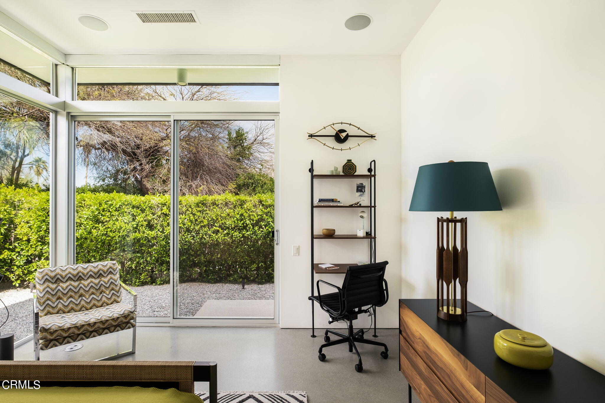 71466 San Gorgonio Road Rancho Mirage, CA 92270 - Photo 23 of 31 a living room with furniture and a window