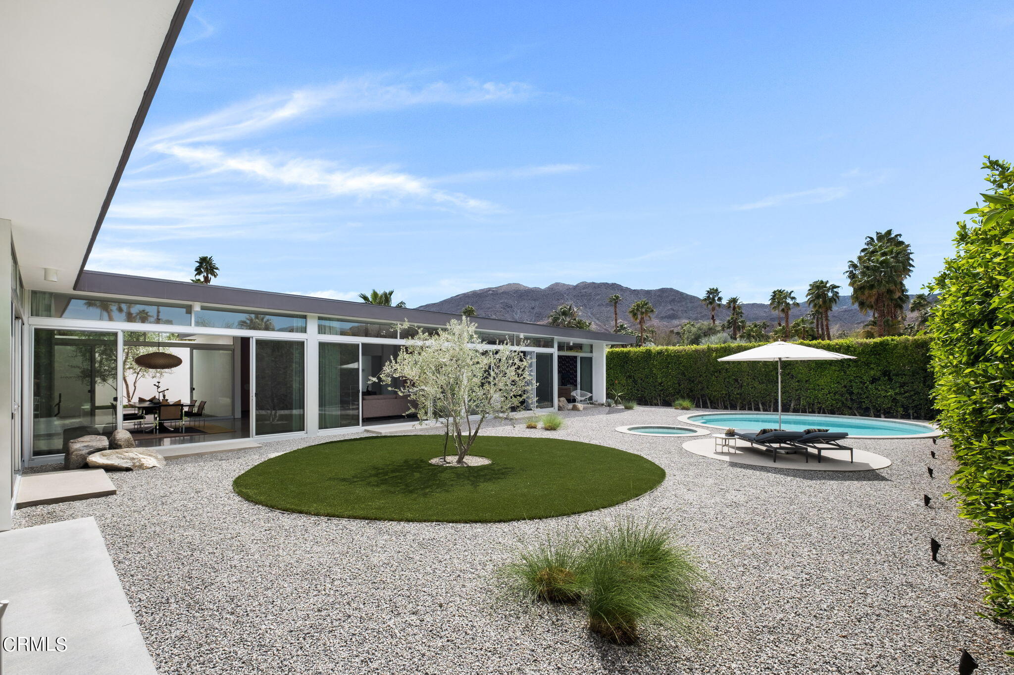 71466 San Gorgonio Road Rancho Mirage, CA 92270 - Photo 24 of 31 a view of a house with backyard porch and sitting area