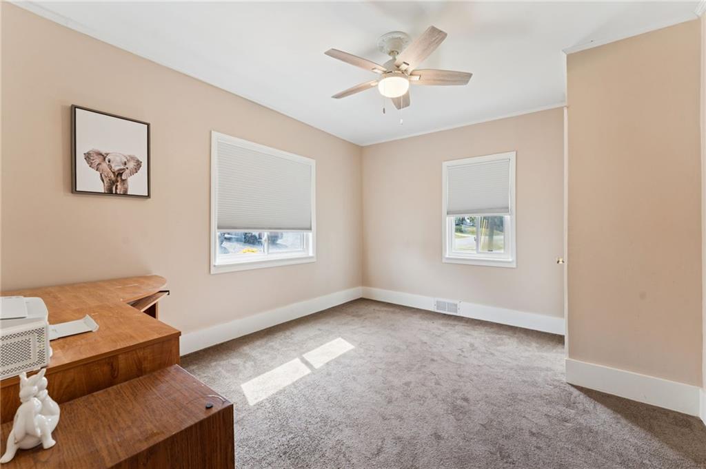 90 Shrader Lane Irwin, PA 15642 - Photo 14 of 39 a view of an empty room with a window