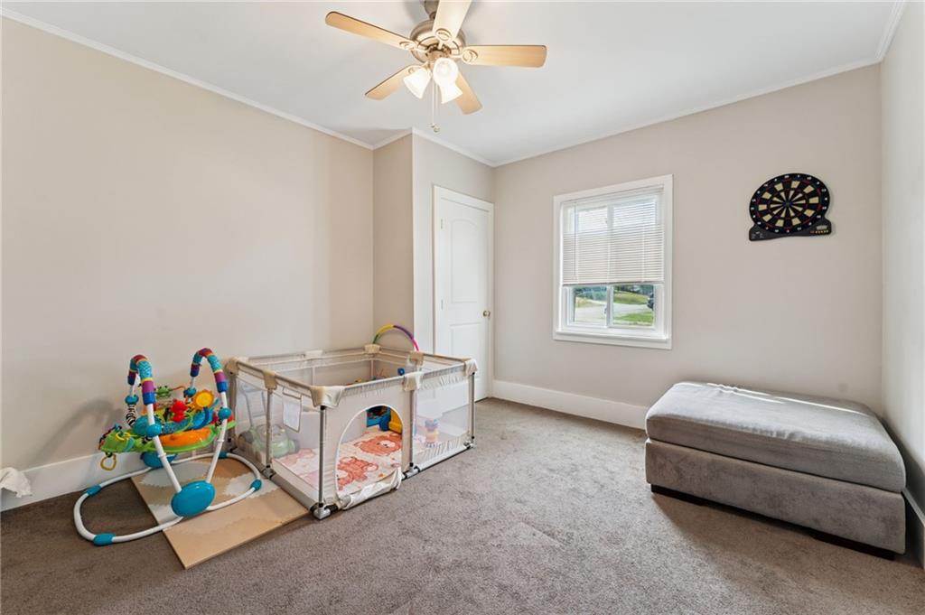 90 Shrader Lane Irwin, PA 15642 - Photo 18 of 39 a room with toys and ceiling fan