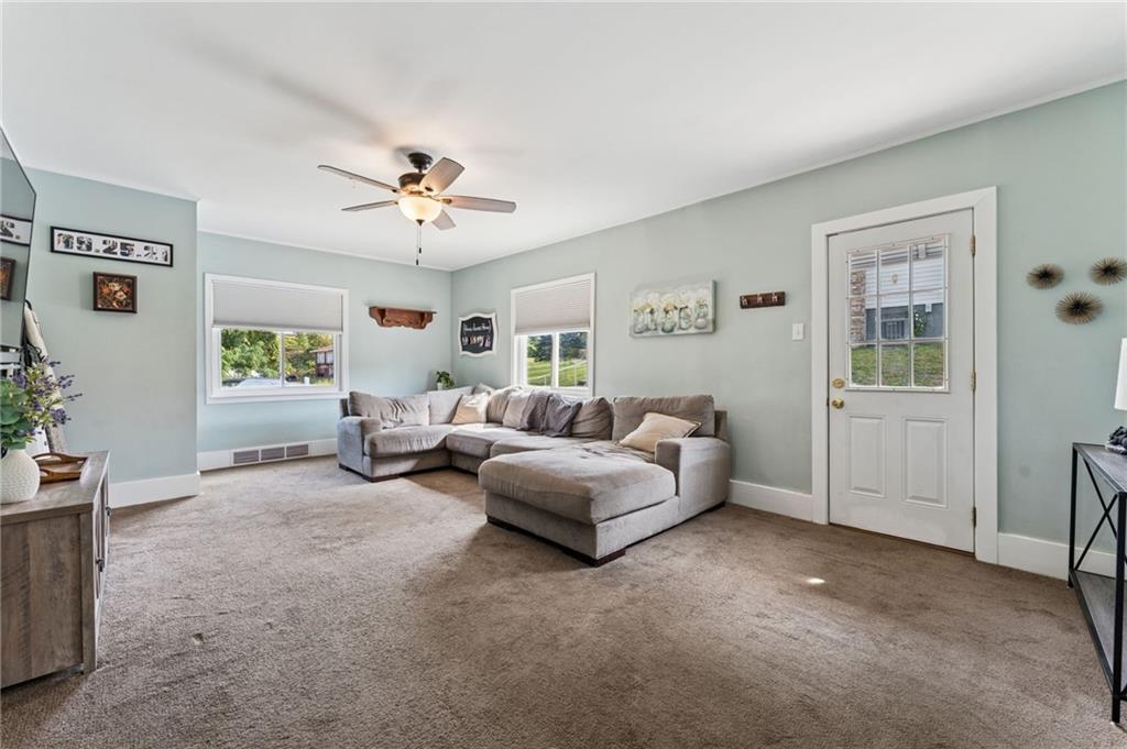 90 Shrader Lane Irwin, PA 15642 - Photo 2 of 39 a living room with furniture and a window