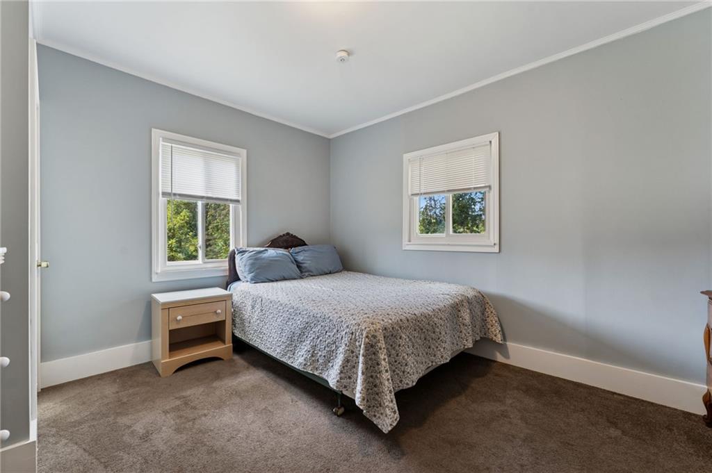 90 Shrader Lane Irwin, PA 15642 - Photo 21 of 39 a bedroom with a bed and a window