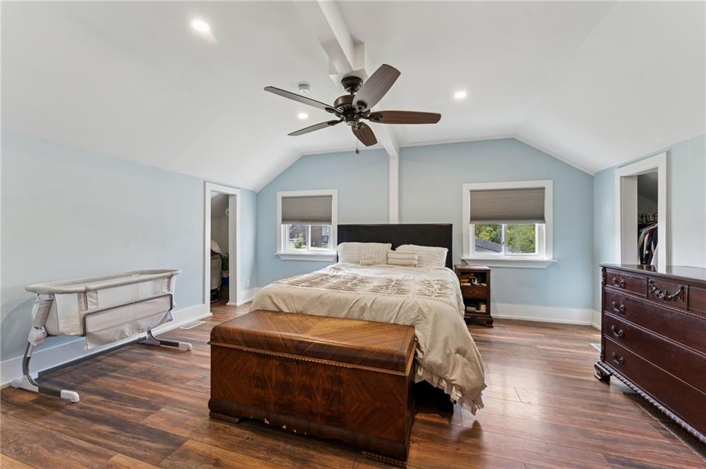 90 Shrader Lane Irwin, PA 15642 - Photo 27 of 39 a bedroom with a bed and wooden floor