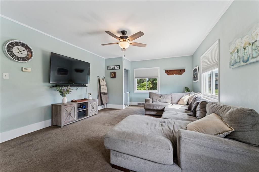 90 Shrader Lane Irwin, PA 15642 - Photo 3 of 39 a living room with furniture and a flat screen tv