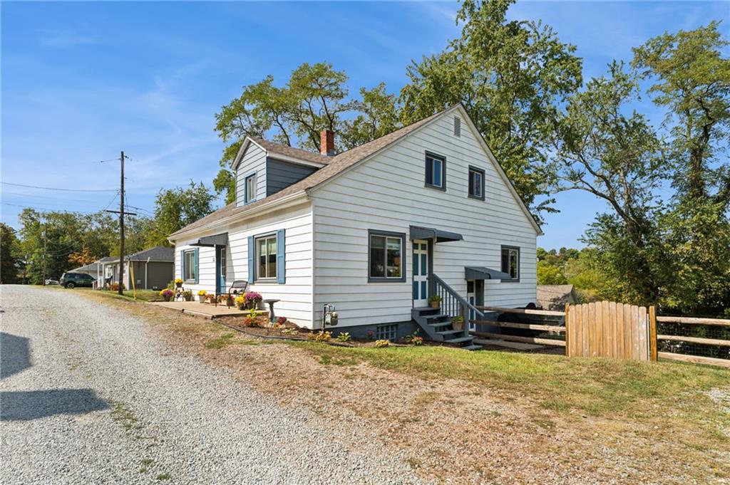 90 Shrader Lane Irwin, PA 15642 - Photo 34 of 39 a view of a house with backyard and sitting area