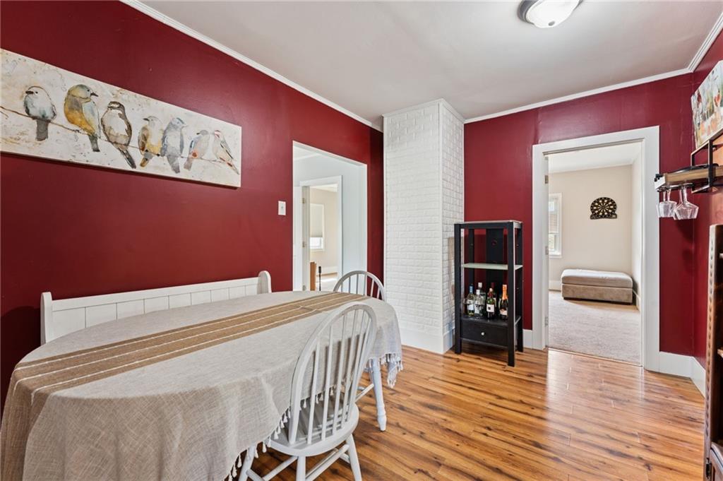 90 Shrader Lane Irwin, PA 15642 - Photo 6 of 39 a bedroom with a bed and wooden floor