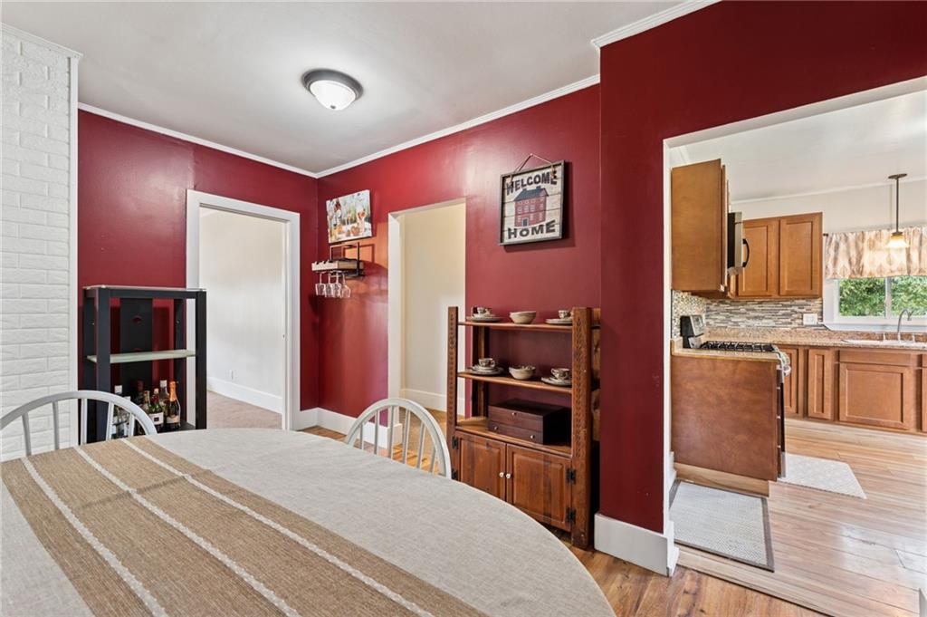 90 Shrader Lane Irwin, PA 15642 - Photo 7 of 39 a bedroom with a bed and a flat screen tv