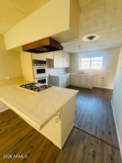 1626 11th Street Douglas, AZ 85607 - Photo 4 of 15 a kitchen with a sink and cabinets