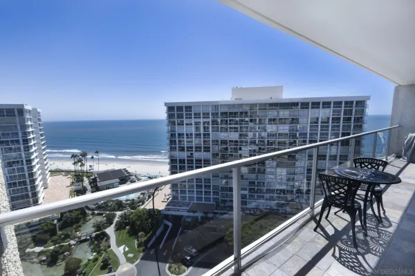 a balcony with a city view