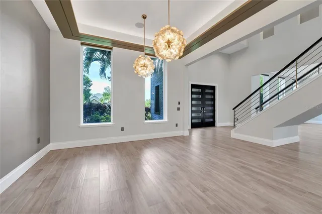a white stove top oven sitting inside of a kitchen