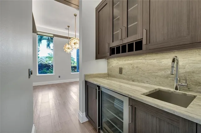 a stove top oven sitting inside of a kitchen