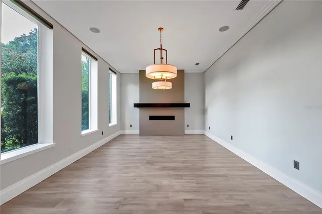 a kitchen with granite countertop a stove and a sink