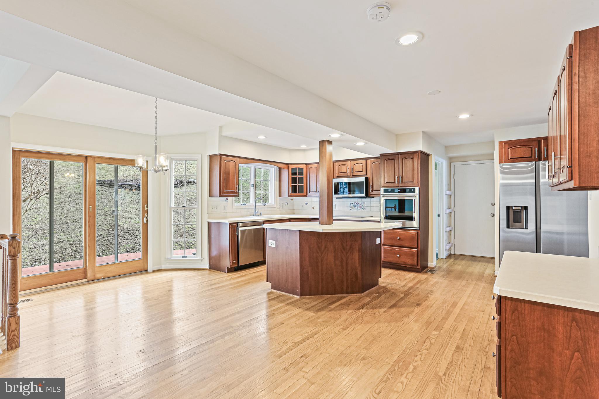 8638 Bali Road Ellicott City, MD 21043 - Photo 5 of 38 Real Hardwood Floors Throughout