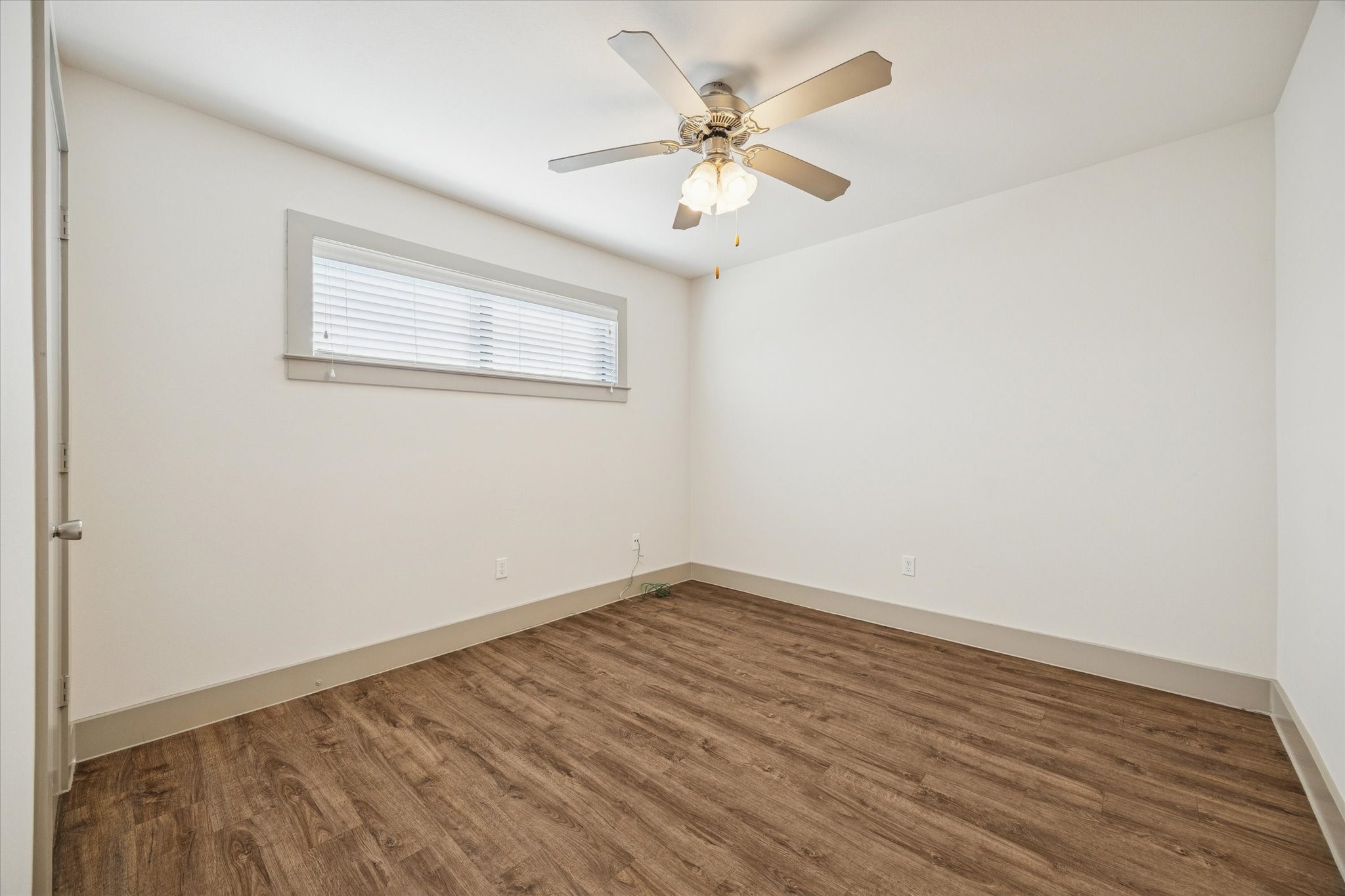 4300 Rosslyn Road, Unit 2 Houston, TX 77018 - Photo 5 of 10 wooden floor in an empty room