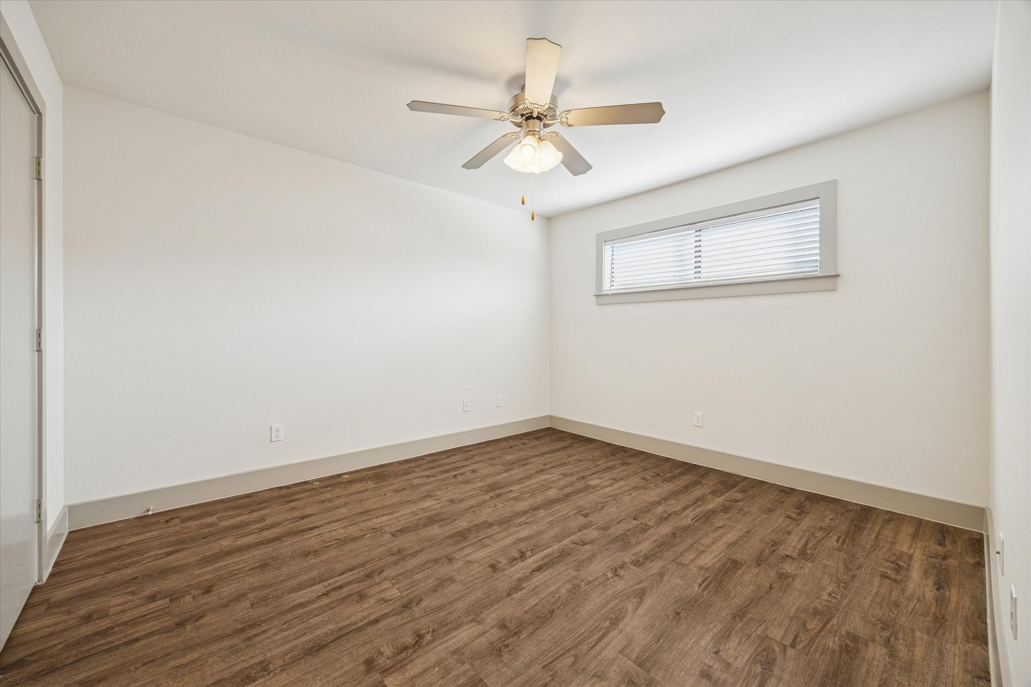 4300 Rosslyn Road, Unit 2 Houston, TX 77018 - Photo 6 of 10 wooden floor in an empty room