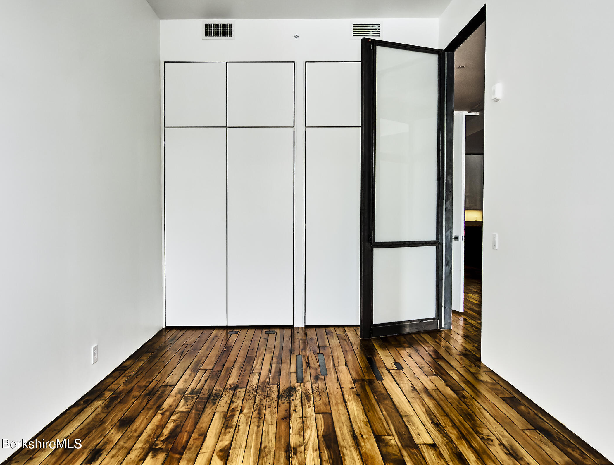 520 State Road, Unit 303 North Adams, MA 01247 - Photo 14 of 16 a view of a room with wooden floor
