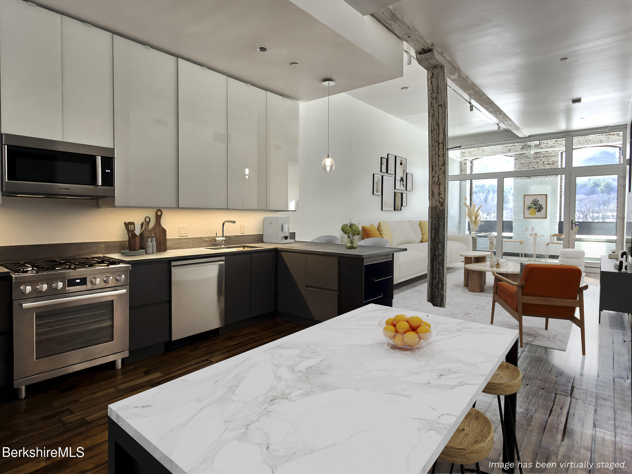 520 State Road, Unit 303 North Adams, MA 01247 - Photo 10 of 16 a kitchen with stainless steel appliances wooden floor dining table and chairs
