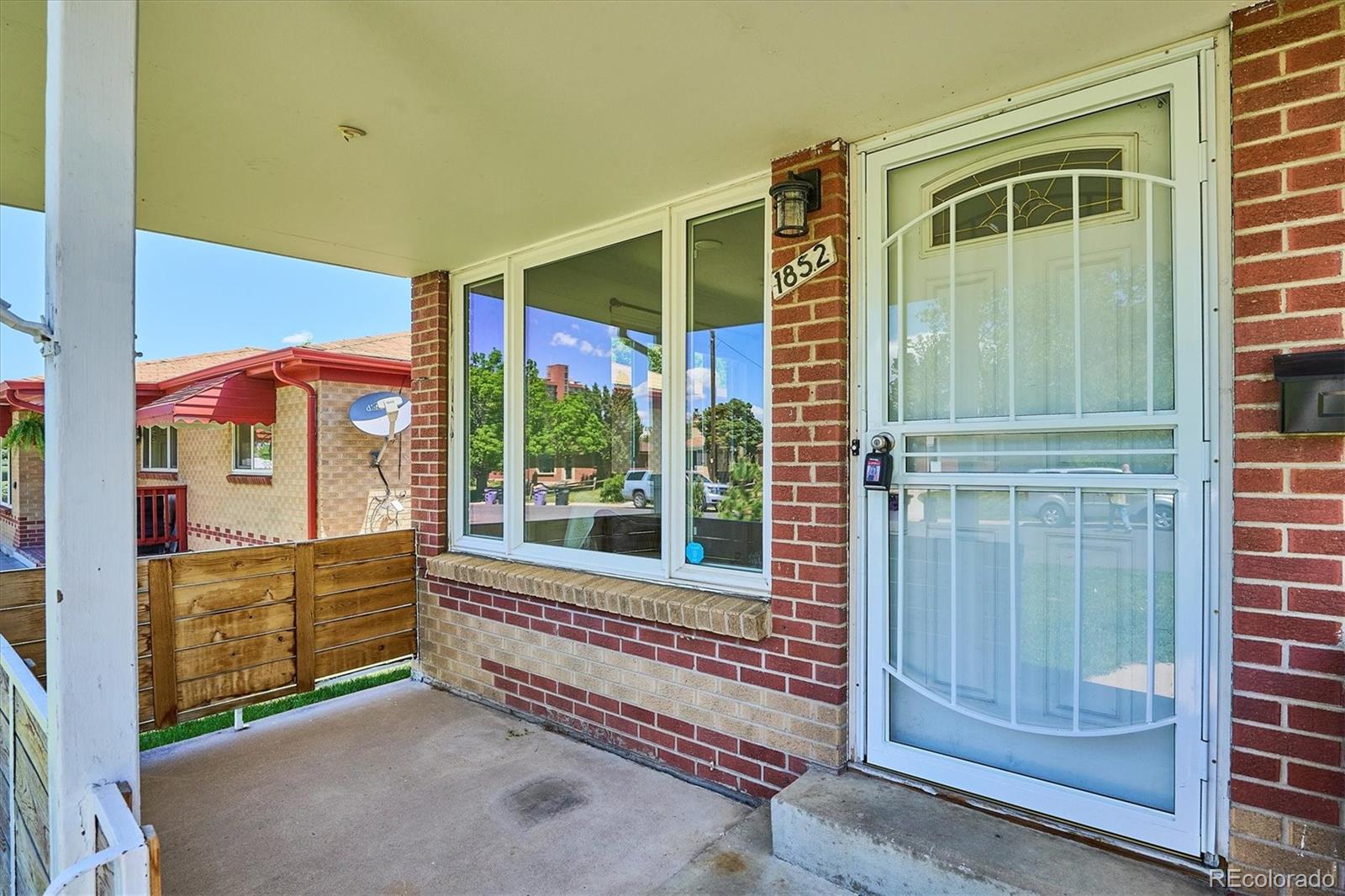 1852 South Decatur Street Denver, CO 80219 - Photo 4 of 45 a view of front door with outdoor space