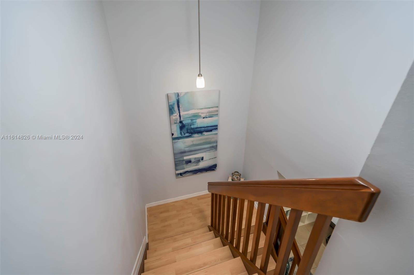 7643 Courtyard Run West Boca Raton, FL 33433 - Photo 22 of 35 a bedroom with a bed and a window