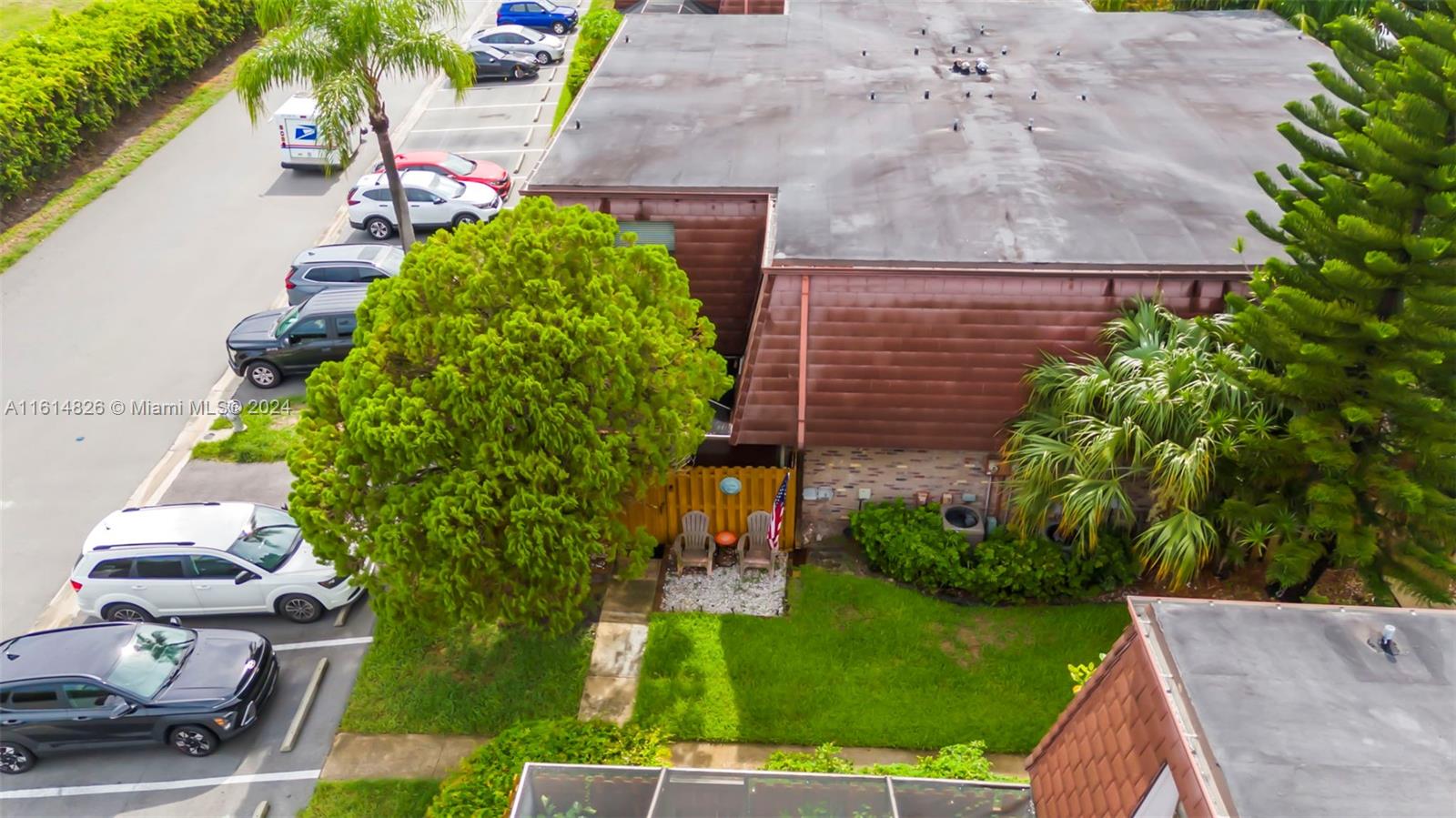 7643 Courtyard Run West Boca Raton, FL 33433 - Photo 28 of 35 a view of a backyard with plants