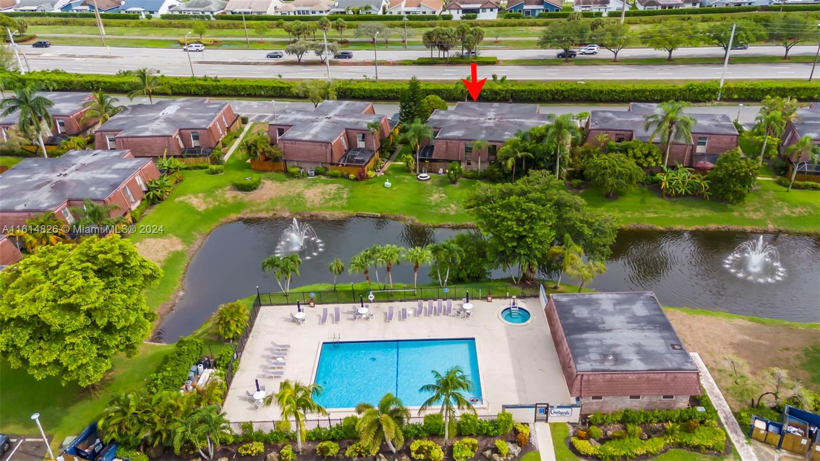 7643 Courtyard Run West Boca Raton, FL 33433 - Photo 34 of 35 an aerial view of a house with a lake view