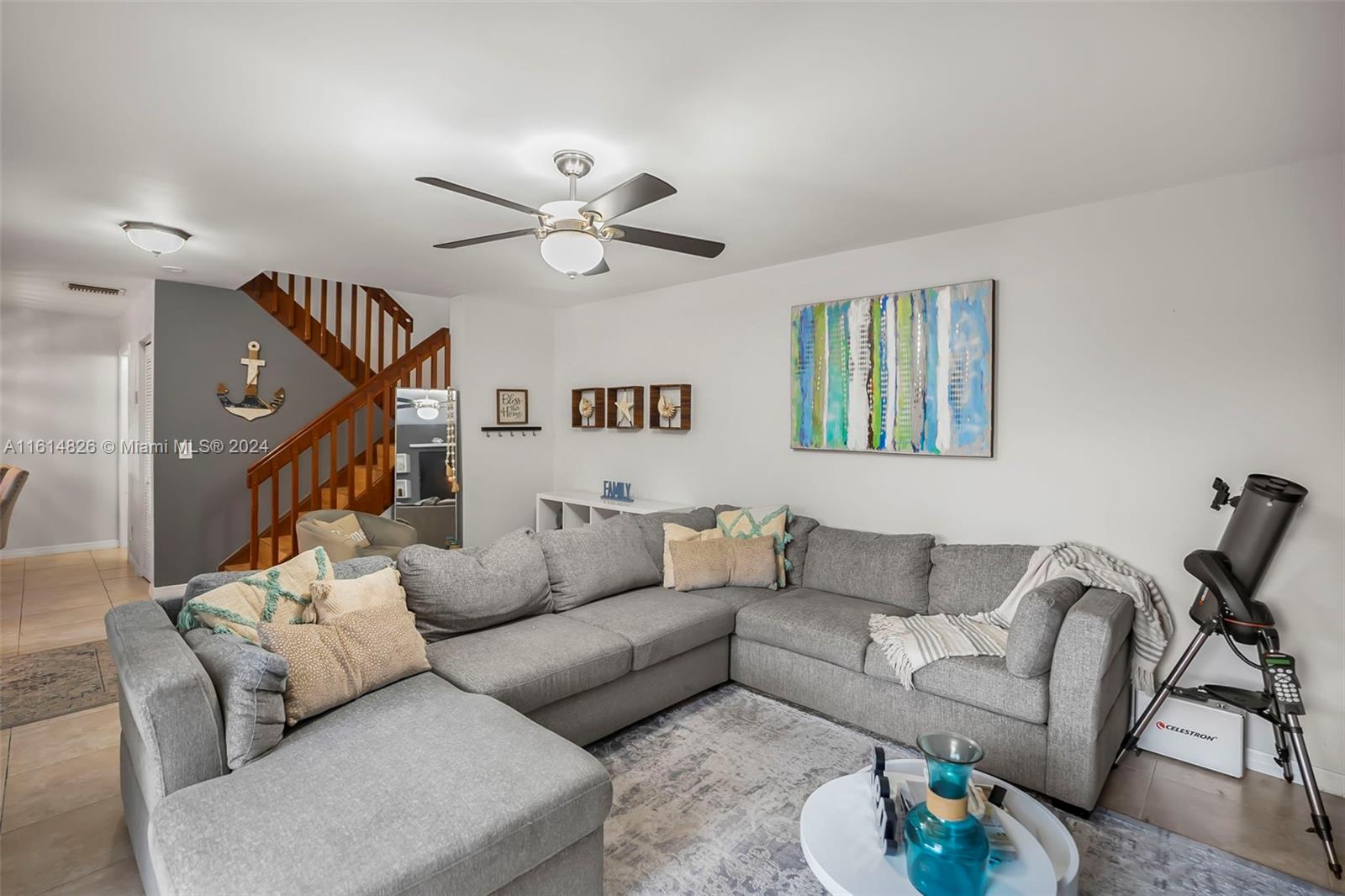 7643 Courtyard Run West Boca Raton, FL 33433 - Photo 6 of 35 a living room with furniture and a wooden floor