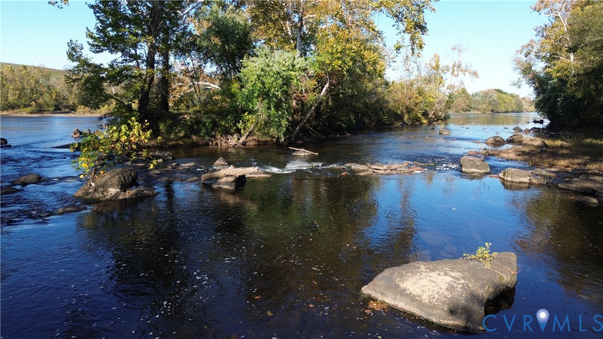 0 Warren Ferry Road Scottsville, VA 24590 - Photo 13 of 33 a view of a lake from a yard