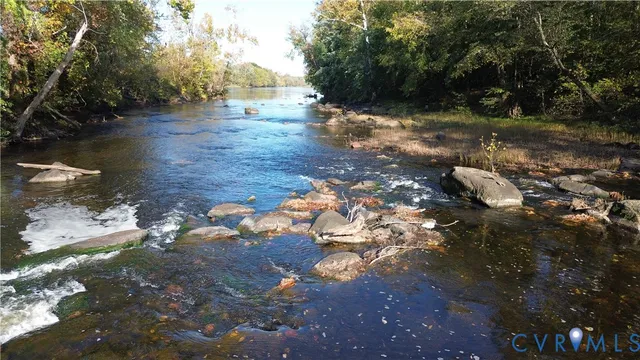 a view of a lake from a house