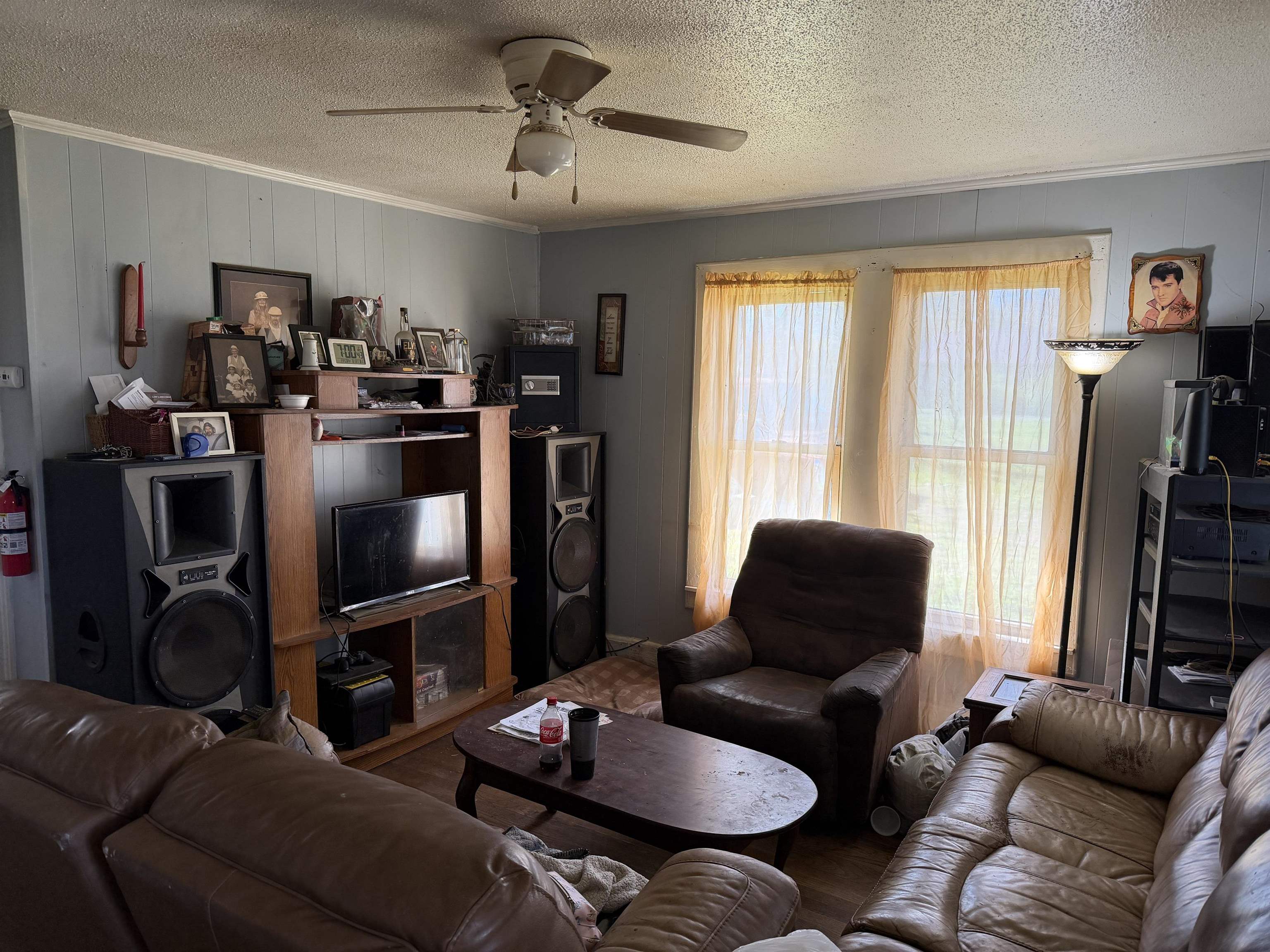 690 Patterson Road Savannah, TN 38372 - Photo 12 of 26 a living room with furniture a flat screen tv and a window