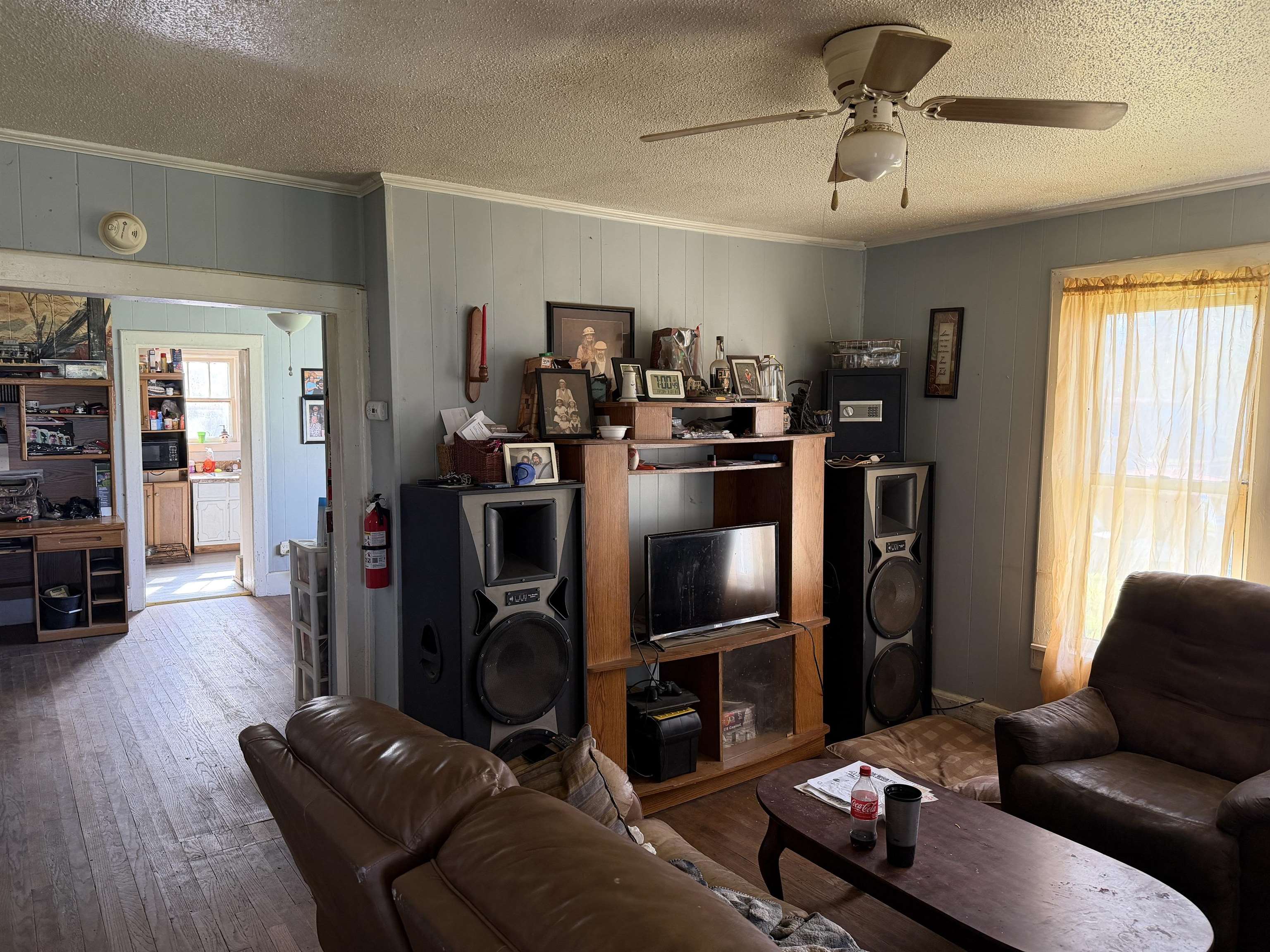 690 Patterson Road Savannah, TN 38372 - Photo 13 of 26 a living room with furniture and a flat screen tv