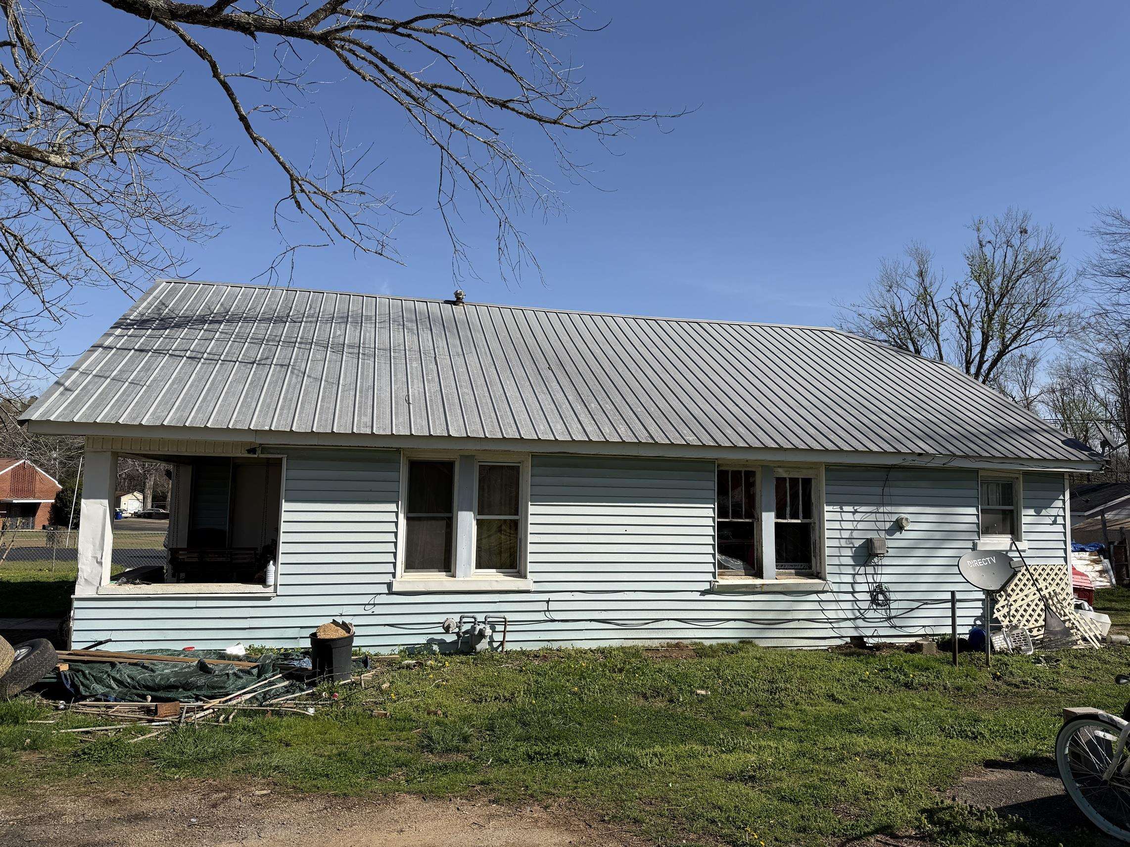 690 Patterson Road Savannah, TN 38372 - Photo 25 of 26 a front view of a house with a yard