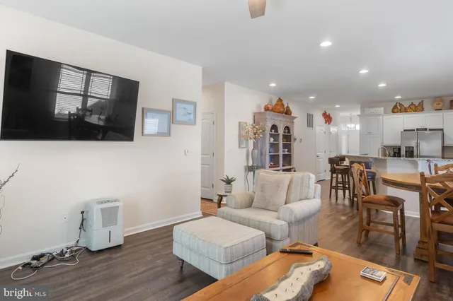 a bathroom with a sink a mirror and a shower