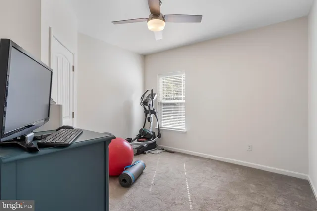 a view of an house with backyard outdoor seating area and furniture