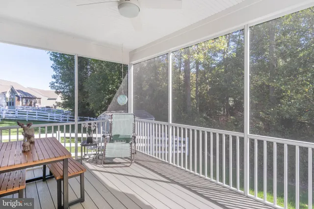 a sign board with buildings in the background