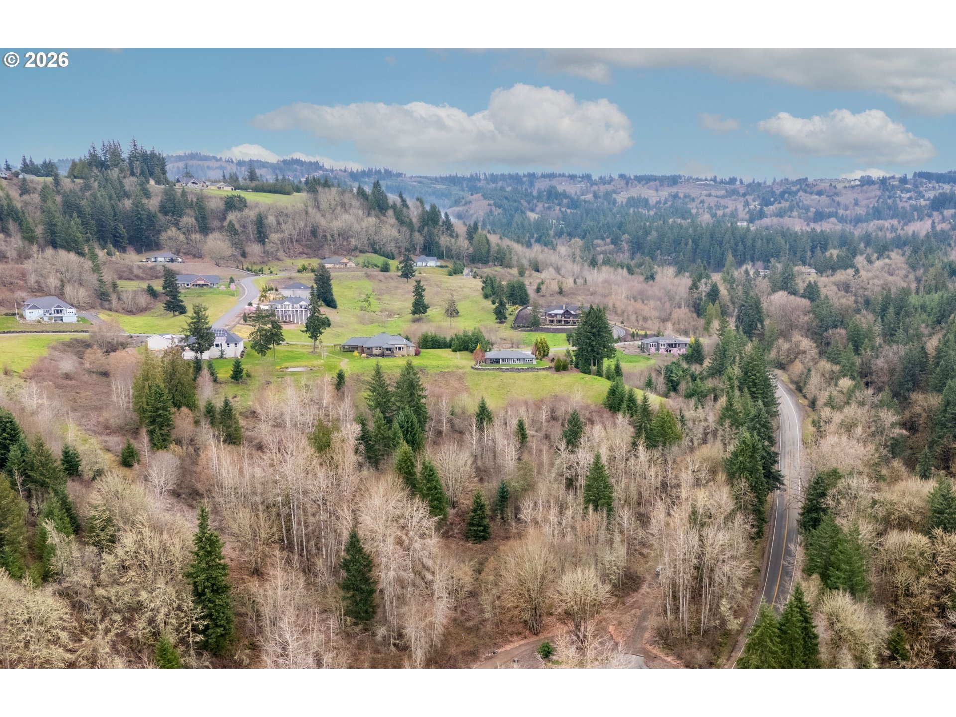 318 Martins Bluff Road Kalama, WA 98625 - Photo 5 of 15 a view of a city and mountains from a balcony