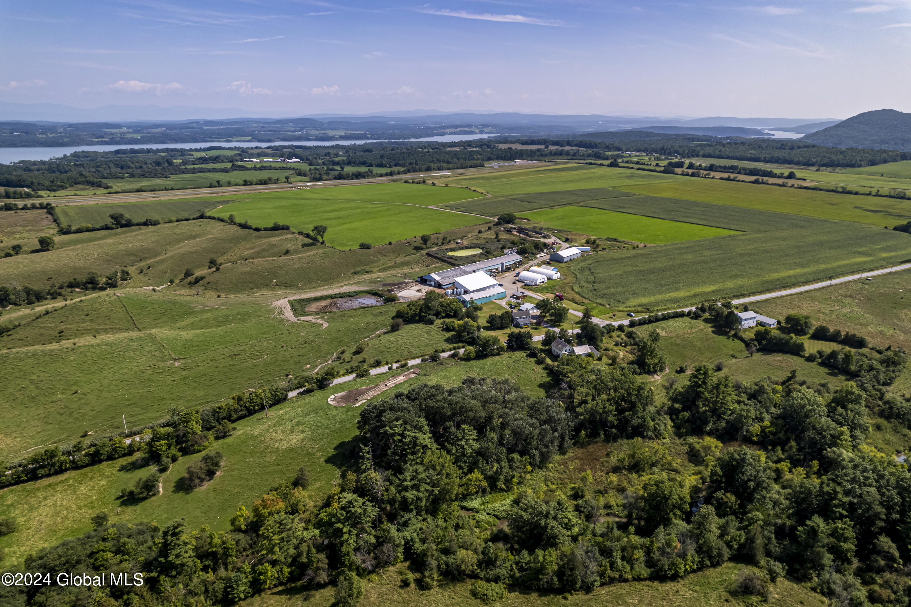 259 Delano Road Ticonderoga, NY 12883 - Photo 4 of 21 ADKPhoto-20240827-DJI_0332-HDR