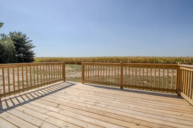 a view of wooden floor with a lake view