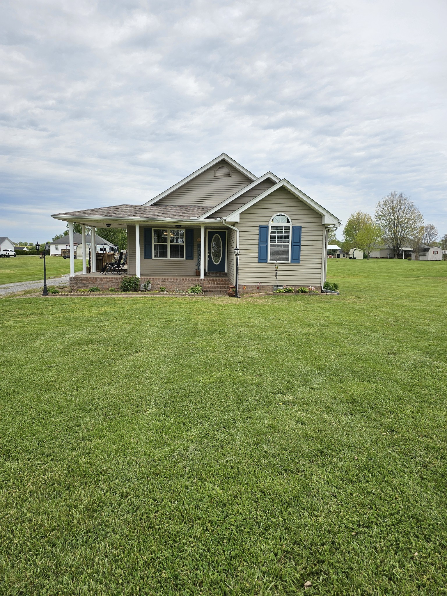 285 Browns Road Lafayette, TN 37083 - Photo 2 of 30 a front view of house with yard and green space