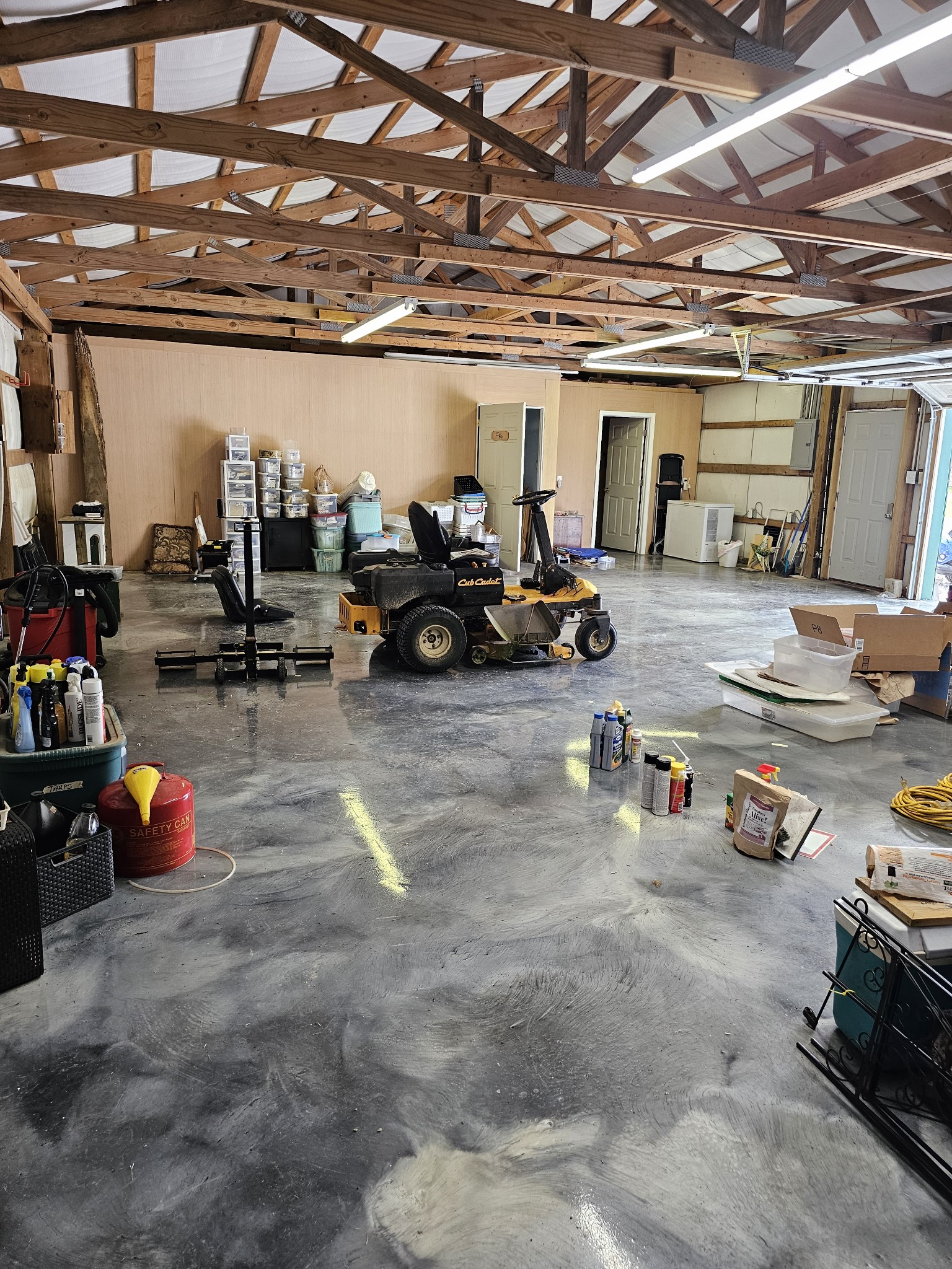 285 Browns Road Lafayette, TN 37083 - Photo 23 of 30 a view of a garage with a bike and wooden roof
