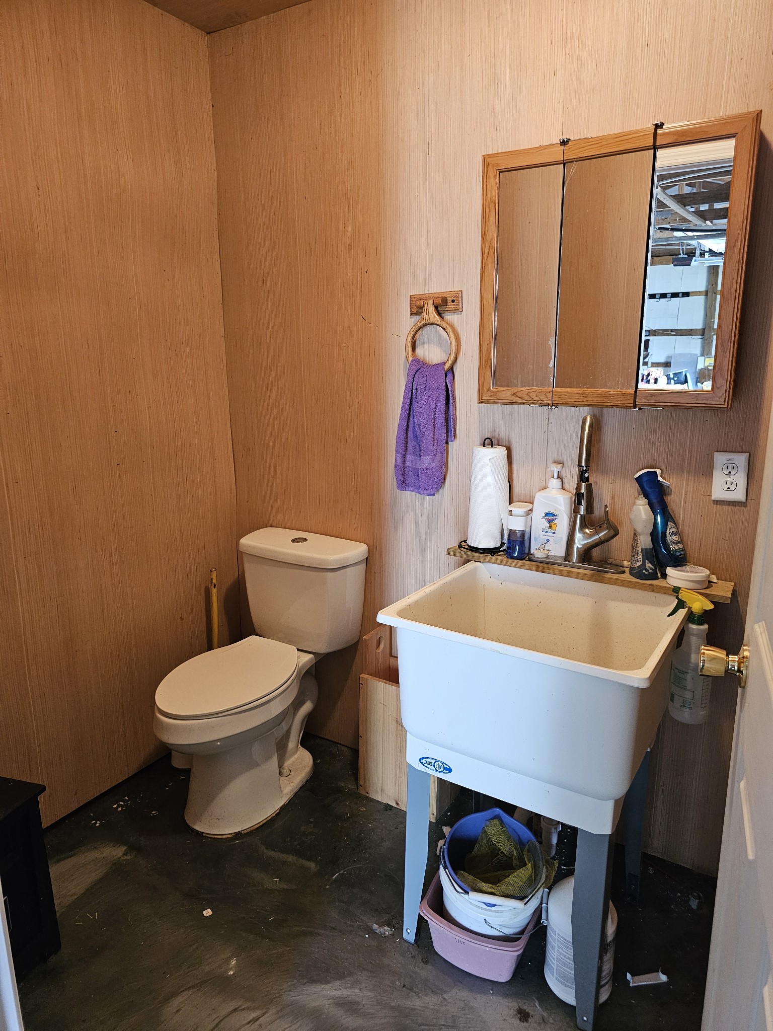 285 Browns Road Lafayette, TN 37083 - Photo 27 of 30 a bathroom with a sink a toilet and a mirror