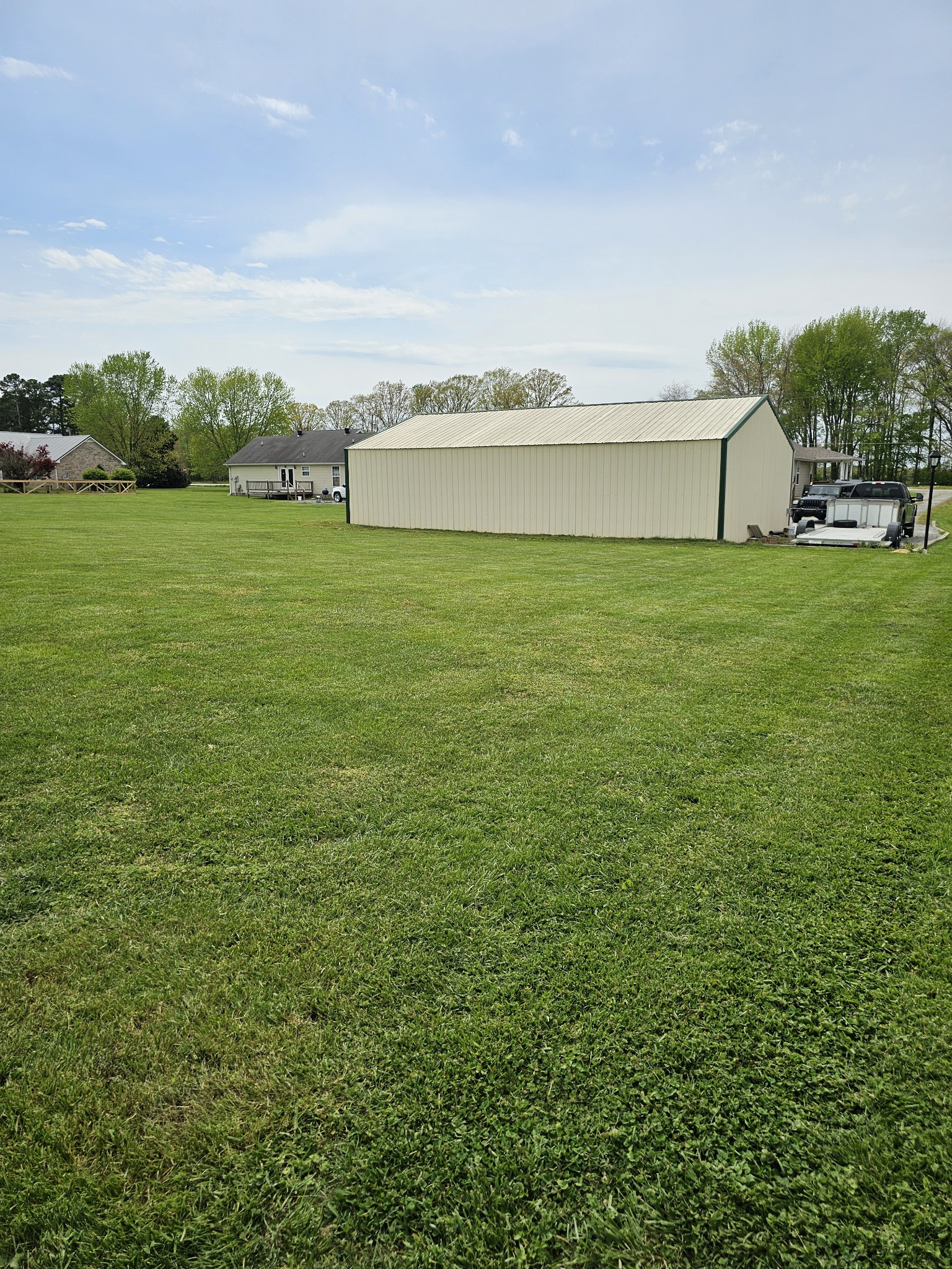285 Browns Road Lafayette, TN 37083 - Photo 28 of 30 a view of a garden with a building in the background