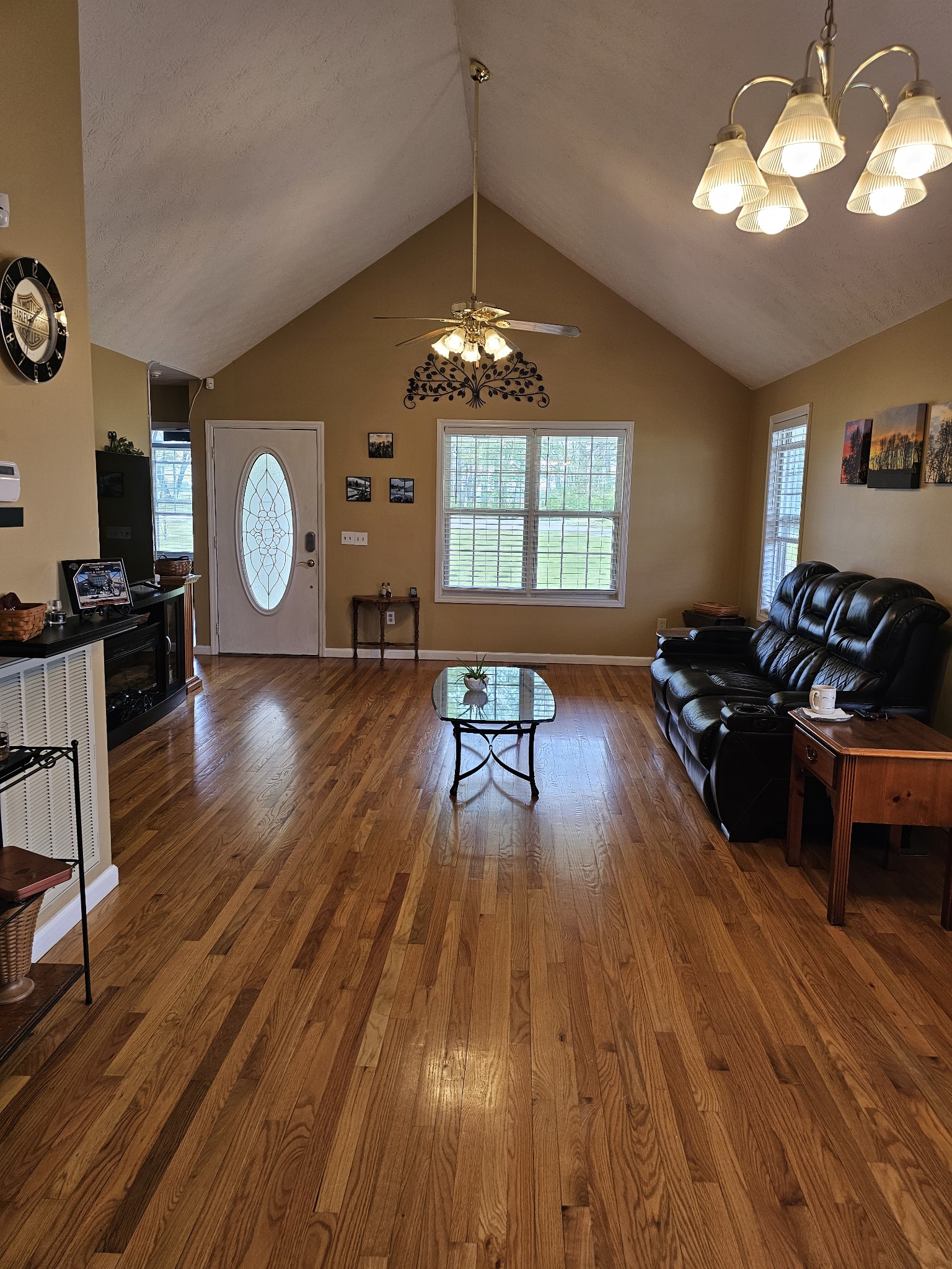 285 Browns Road Lafayette, TN 37083 - Photo 7 of 30 a living room with furniture dining table and a chandelier