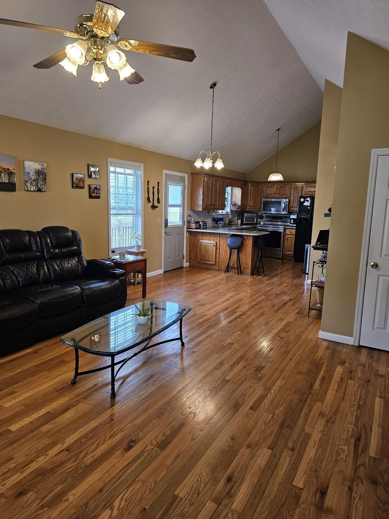 285 Browns Road Lafayette, TN 37083 - Photo 9 of 30 a living room with fireplace furniture and a wooden floor