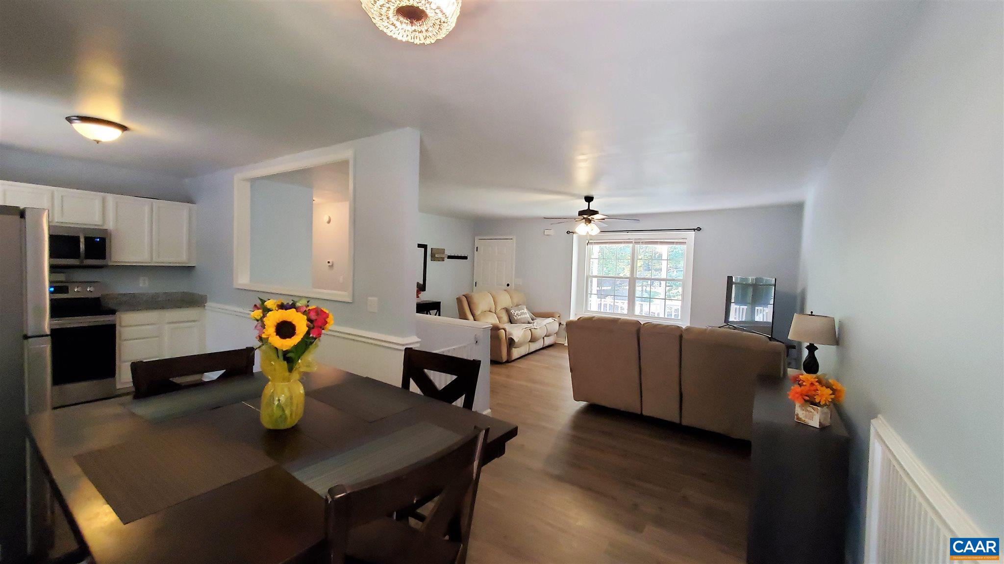 26 Xebec Road Palmyra, VA 22963 - Photo 4 of 21 a living room with kitchen island furniture and a window