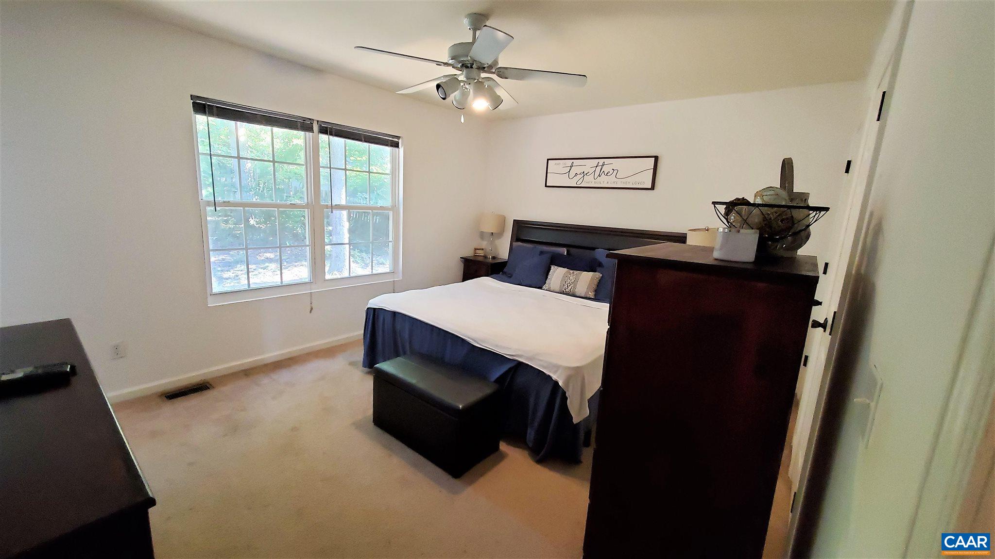 26 Xebec Road Palmyra, VA 22963 - Photo 10 of 21 a bedroom with a bed and a window