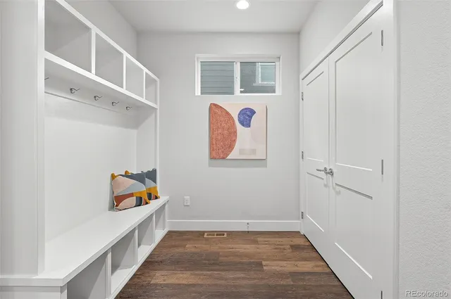 a window and a table and chair in the patio