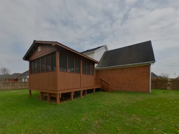 a house view with a garden space