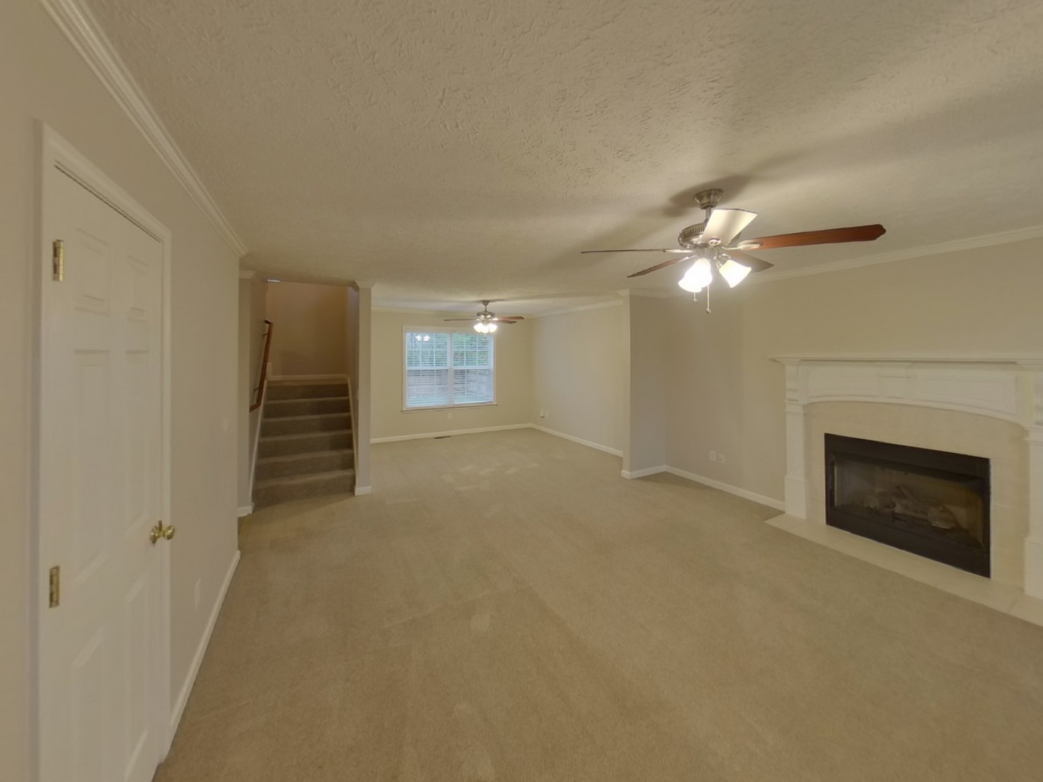 4812 Hammock Drive Murfreesboro, TN 37128 - Photo 3 of 17 a view of an empty room with chandelier and fireplace