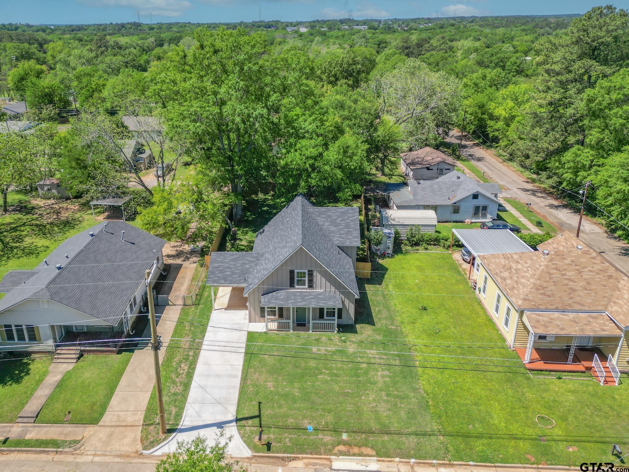 233 Harrison Street Longview, TX 75601 - Photo 2 of 44 an aerial view of a house